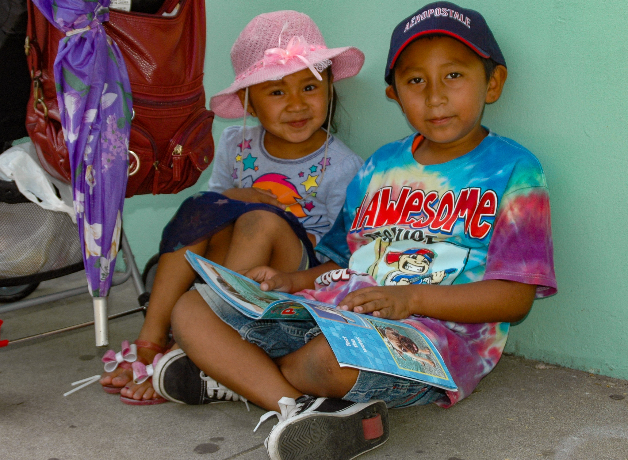 Two children at an NC4GK distribution